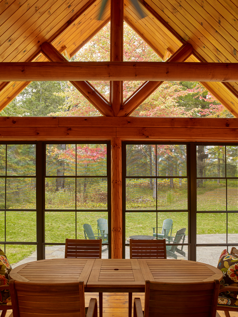 Three-season porch at Beaver Mountain Log Home
